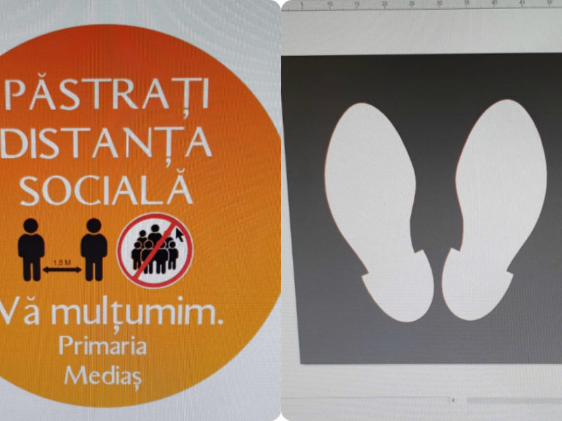 pictograme lipite pe jos pentru distanța socială minimă dintre două persoane, la mediaș