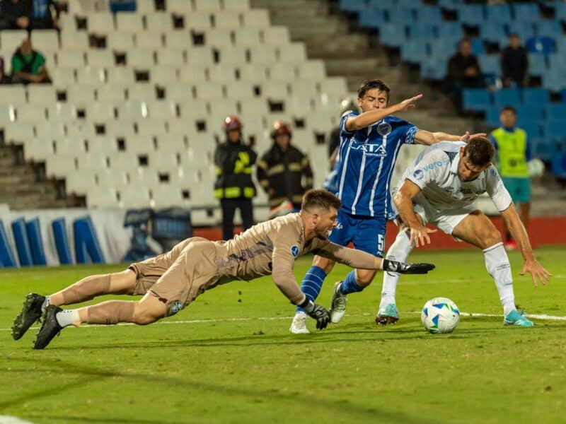 intense soccer match action with goalkeeper and players